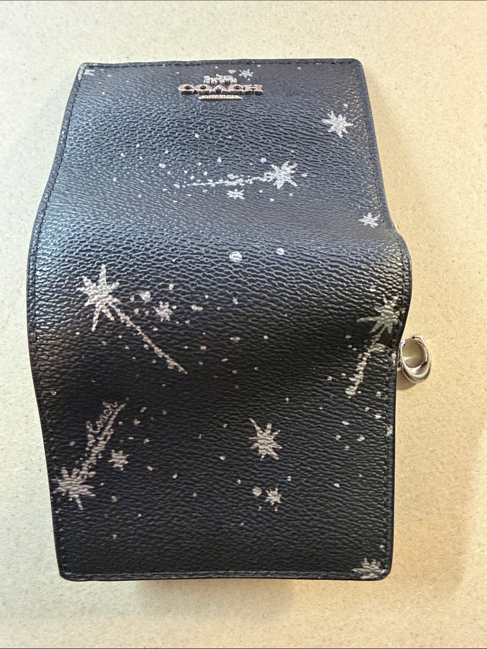 Coach Black Leather Wallet with Silver Star Print